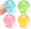 4 coloured translucent coconut oil sensory squishy balls blue green pink yellow on white