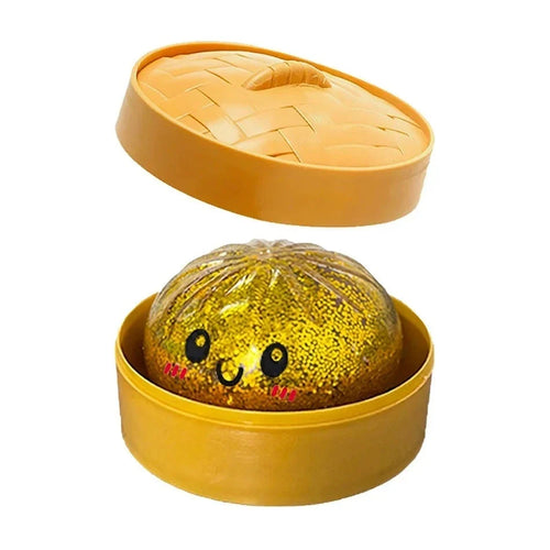 Gold Glitter Dumpling Squishy in golden display box – main product photo
