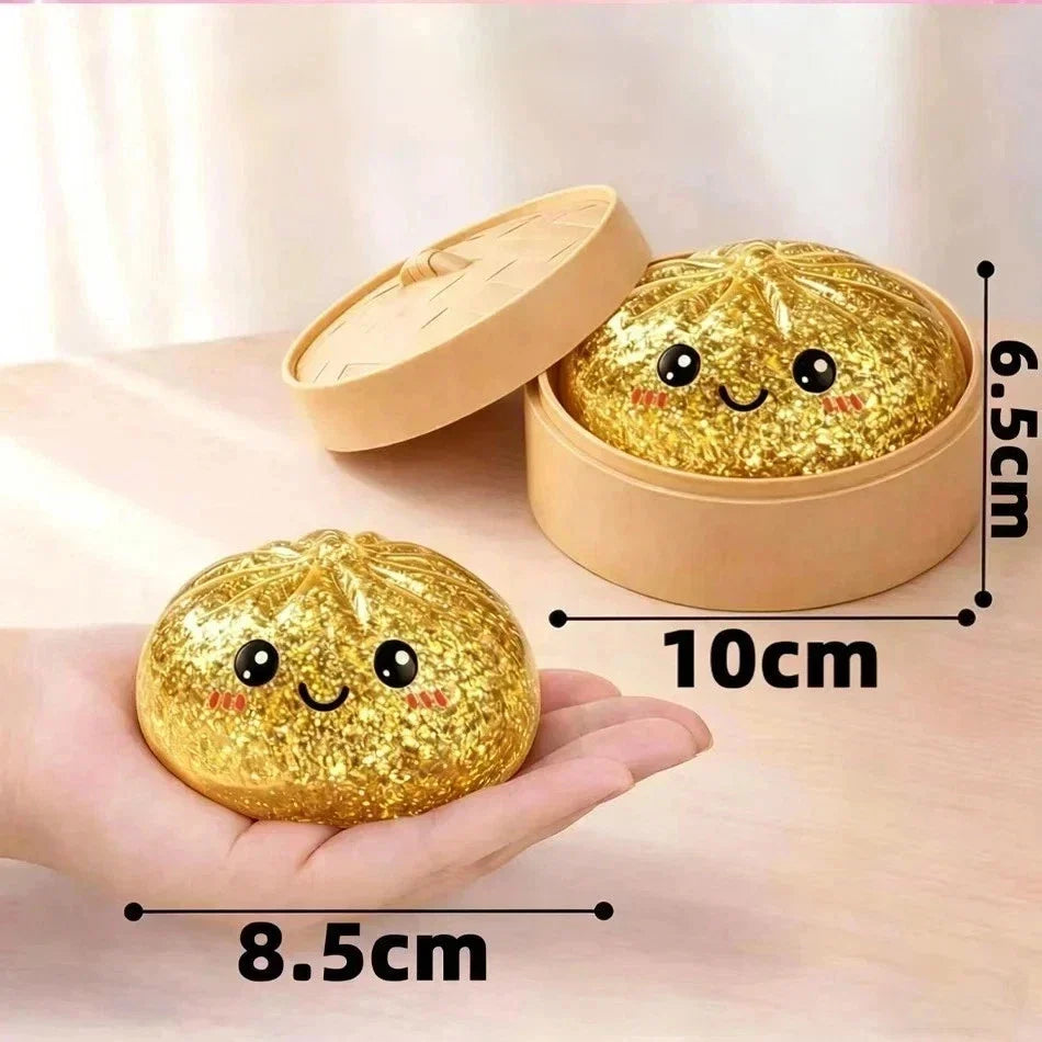 Gold Glitter Dumpling Squishy dimensions and hand size comparison