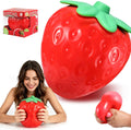 Jumbo Strawberry Squishy with green leaves, red berry texture and retail box